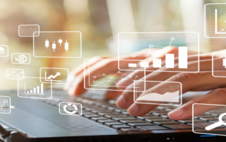 business man typing on laptop